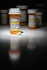 Image showing Hydrocodone Pills and Prescription Bottles with Non Proprietary 