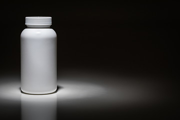 Image showing Blank White Bottle Ready For Your Text Under Spot Light.