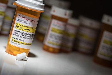 Image showing Hydrocodone Pills and Prescription Bottles with Non Proprietary 