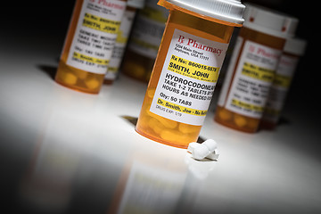 Image showing Hydrocodone Pills and Prescription Bottles with Non Proprietary 