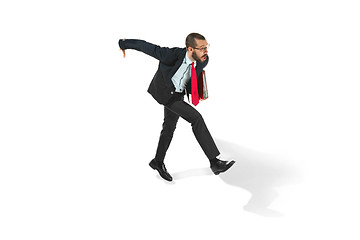 Image showing Businessman running with a folder on white background