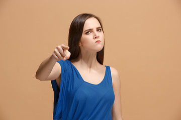 Image showing The overbearing woman point you and want you, half length closeup portrait on pastel background.