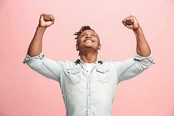 Image showing Winning success man happy ecstatic celebrating being a winner. Dynamic energetic image of male model