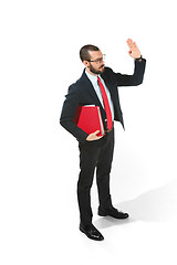 Image showing Choose me. Full body view of businessman with red folder on white studio background