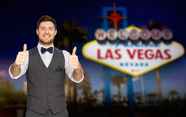 Image showing happy man showing thumbs up over las vegas sign