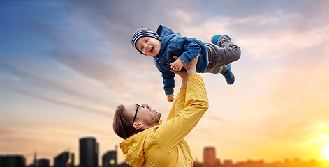 Image showing father with son playing and having fun outdoors