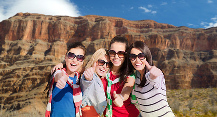 Image showing teenage girls or young women showing thumbs up