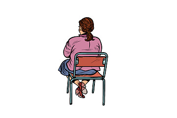 Image showing Woman back sitting on a chair