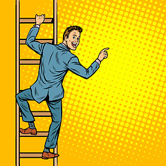 Image showing businessman climbs stairs, man points to copy space