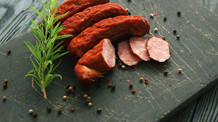 Image showing Tasty sausages and spices