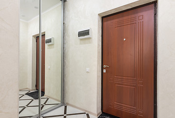 Image showing Sliding wardrobe in the hallway of a small apartment