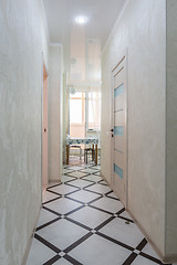 Image showing A long corridor leading to the kitchen, in the apartment