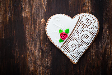 Image showing Gingerbread heart on wooden background