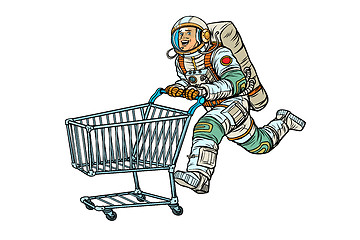 Image showing Astronaut in the store with a shopping cart. Isolate on white ba