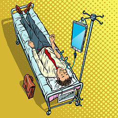 Image showing Dependency on gadgets concept. Man under medical dropper