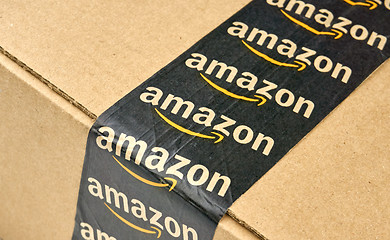 Image showing Amazon shipping box with branded tape.