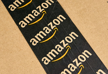 Image showing Amazon shipping box with branded tape.