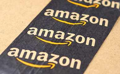 Image showing Amazon shipping box with branded tape.