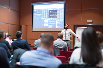 Image showing Businessman Giving a Talk at Business Meeting.