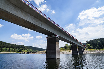 Image showing Large bridge over a river in beautiful nature