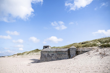 Image showing Dune on a beach with ruins of 2nd world war