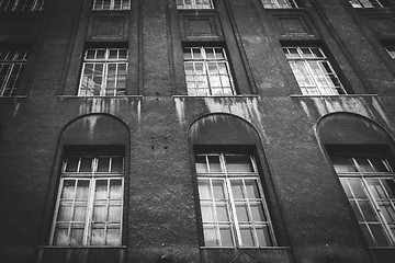 Image showing Dark building with tall windows