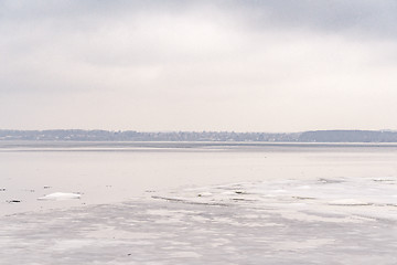 Image showing Frozen lake in the wintertime with ice