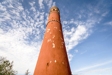 Image showing Tall red round tower heading to the sky