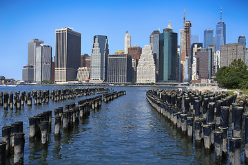 Image showing Manhattan Skyline with wooden logs, New York City