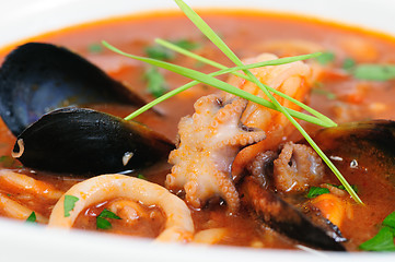 Image showing Seafood Soup in white dish closeup