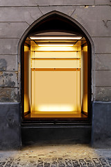 Image showing illuminated shopwindow in retro building