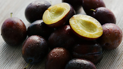 Image showing Fresh plum on table 