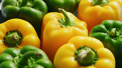 Image showing Abundance of green and yellow peppers