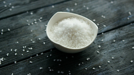 Image showing Salt in bowl on table 