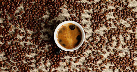 Image showing Cup of espresso and coffee beans