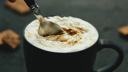 Image showing Cup of coffee with cream