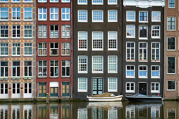 Image showing Amsterdam canal Damrak with houses, Netherlands