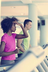 Image showing people exercisinng a cardio on treadmill in gym