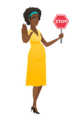 Image showing African pregnant woman holding stop road sign.