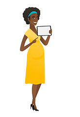 Image showing Smiling pregnant woman holding tablet computer.