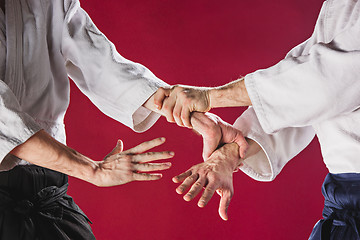 Image showing Two men fighting at Aikido training in martial arts school