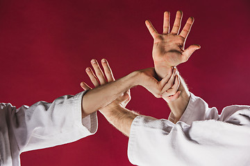 Image showing Two men fighting at Aikido training in martial arts school