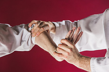 Image showing Two men fighting at Aikido training in martial arts school