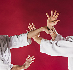 Image showing Two men fighting at Aikido training in martial arts school