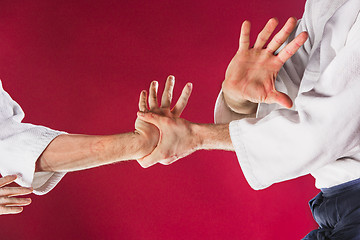 Image showing Two men fighting at Aikido training in martial arts school