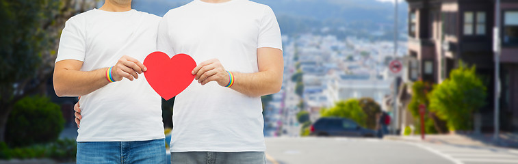 Image showing couple with gay pride rainbow wristbands and heart