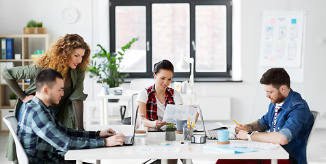 Image showing creative team working on user interface at office