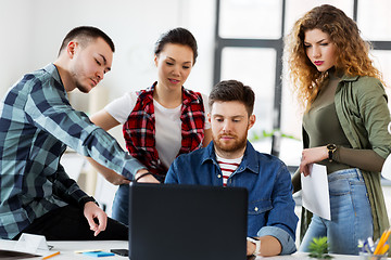 Image showing creative team with laptop working at office