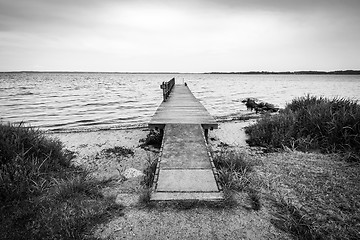 Image showing Black and white photo of a wooden pier