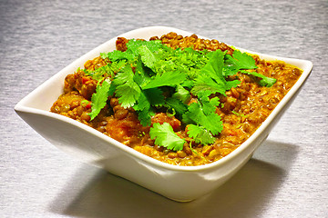 Image showing Moong Dahl, indian vegetarian lentil soup in white bowl.